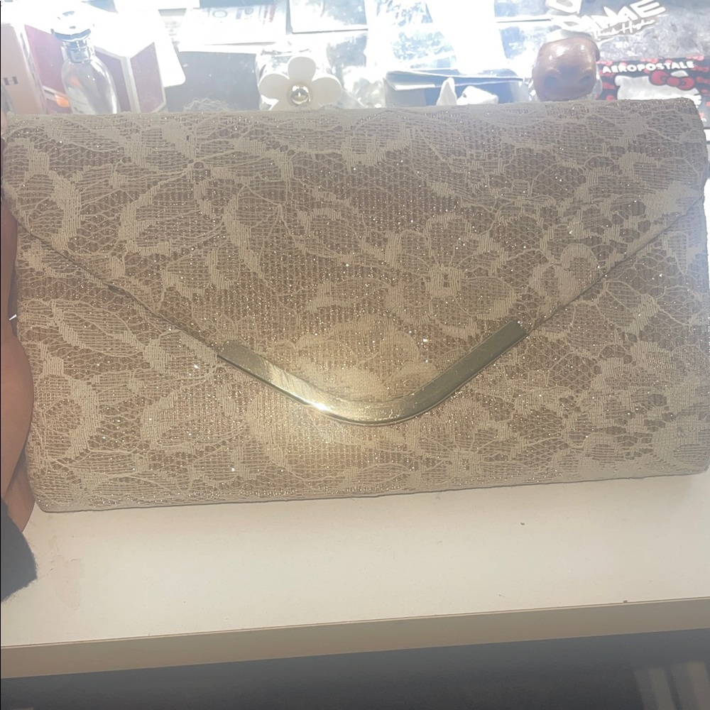Elegant Cream Lace Clutch